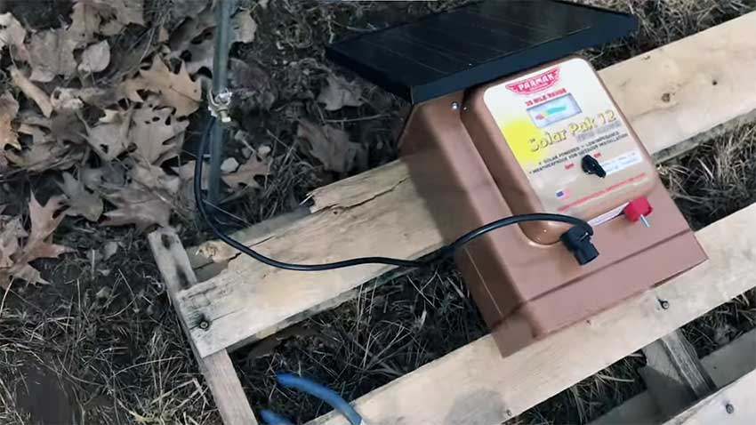 Connecting ground rod to energizer at the ground point.