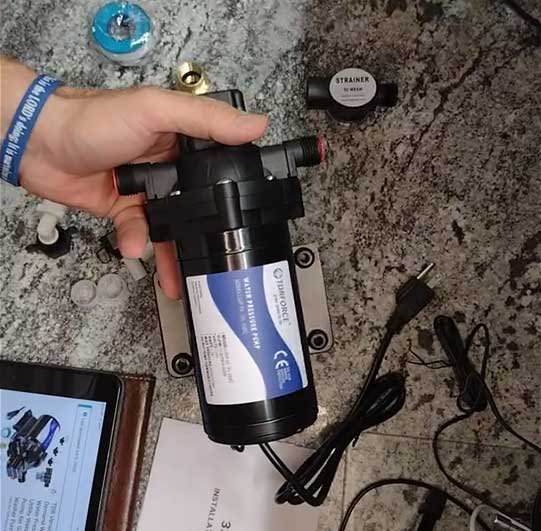 Inline pump for rainwater system
