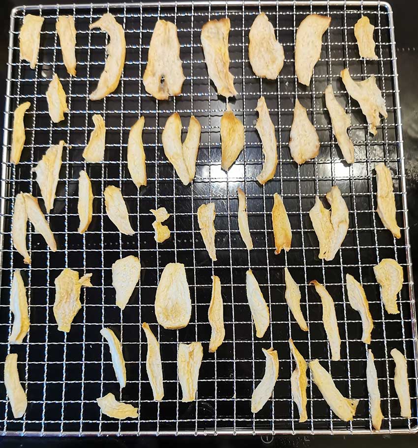 A tray full of dehydrated pears